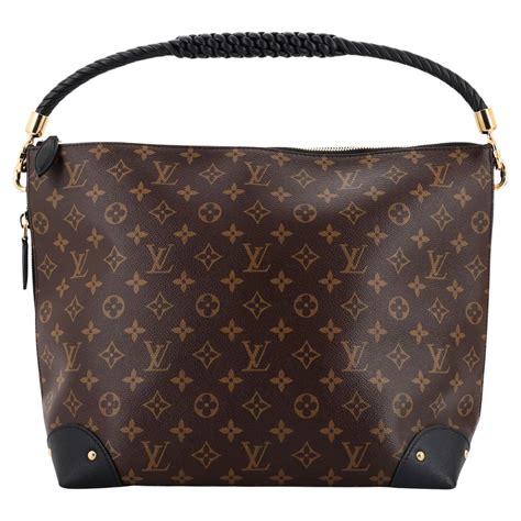 Louis Vuitton Reverse Monogram Triangle Softy Bag .